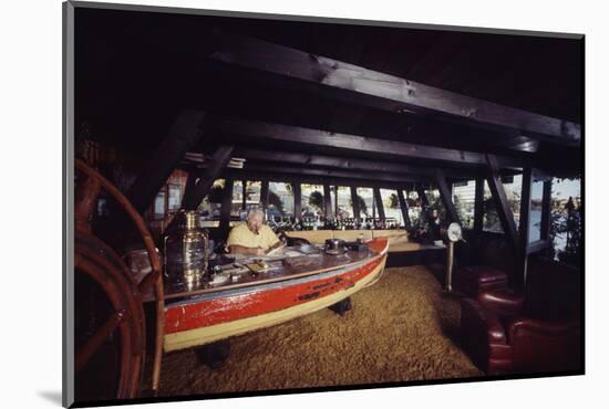 Floating-Home Owner Warren Owen Fonslor Works at a Desk in His Office, Sausalito, CA, 1971-Michael Rougier-Mounted Photographic Print