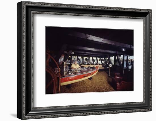 Floating-Home Owner Warren Owen Fonslor Works at a Desk in His Office, Sausalito, CA, 1971-Michael Rougier-Framed Photographic Print