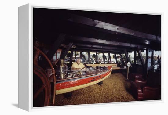 Floating-Home Owner Warren Owen Fonslor Works at a Desk in His Office, Sausalito, CA, 1971-Michael Rougier-Framed Premier Image Canvas