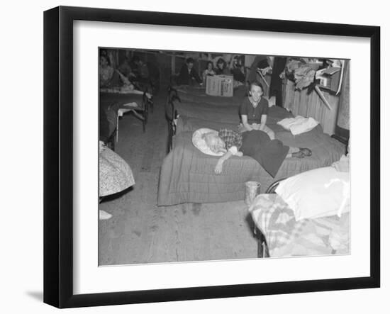 Flood refugees in a factory used by the Red Cross as a relief station in Mayfield, Kentucky, 1937-Walker Evans-Framed Photographic Print