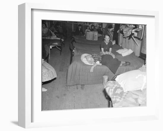 Flood refugees in a factory used by the Red Cross as a relief station in Mayfield, Kentucky, 1937-Walker Evans-Framed Photographic Print