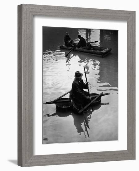 Flood Victim Paddling Boat Fashioned Out of Four Washtubs in the Flood Waters of Mississippi River-Margaret Bourke-White-Framed Photographic Print