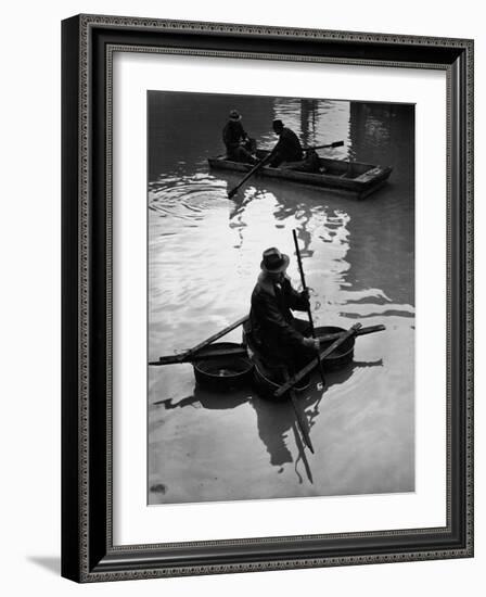 Flood Victim Paddling Boat Fashioned Out of Four Washtubs in the Flood Waters of Mississippi River-Margaret Bourke-White-Framed Photographic Print