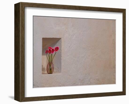 Floral tribute growing a niche in the stone walls of Ballintubber Abbey, County Mayo, Ireland.-Betty Sederquist-Framed Photographic Print