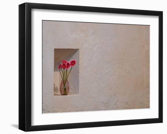 Floral tribute growing a niche in the stone walls of Ballintubber Abbey, County Mayo, Ireland.-Betty Sederquist-Framed Photographic Print