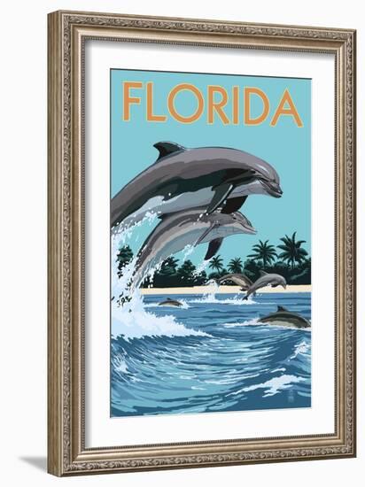 Florida - Dolphins Jumping-Lantern Press-Framed Art Print