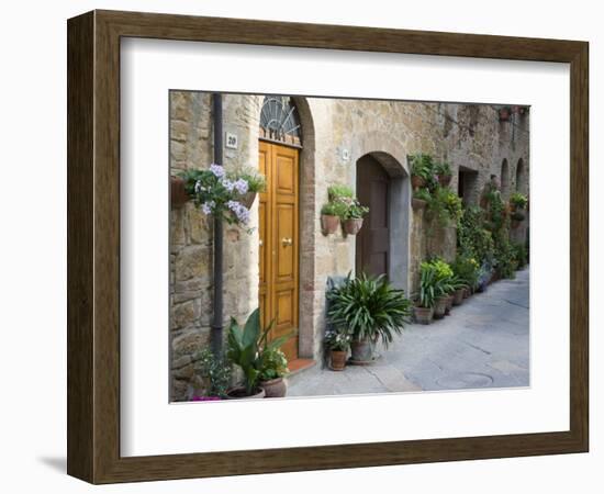 Flower Pots and Potted Plants Decorate a Narrow Street in Tuscan Village, Pienza, Italy-Dennis Flaherty-Framed Premium Photographic Print