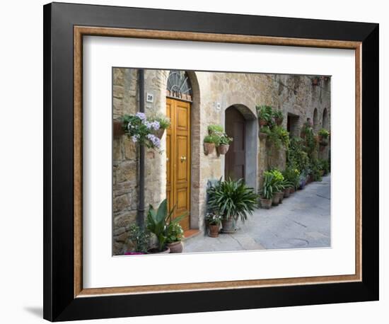 Flower Pots and Potted Plants Decorate a Narrow Street in Tuscan Village, Pienza, Italy-Dennis Flaherty-Framed Premium Photographic Print