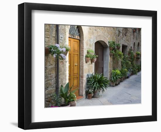 Flower Pots and Potted Plants Decorate a Narrow Street in Tuscan Village, Pienza, Italy-Dennis Flaherty-Framed Premium Photographic Print