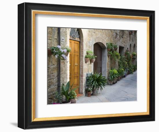 Flower Pots and Potted Plants Decorate a Narrow Street in Tuscan Village, Pienza, Italy-Dennis Flaherty-Framed Premium Photographic Print