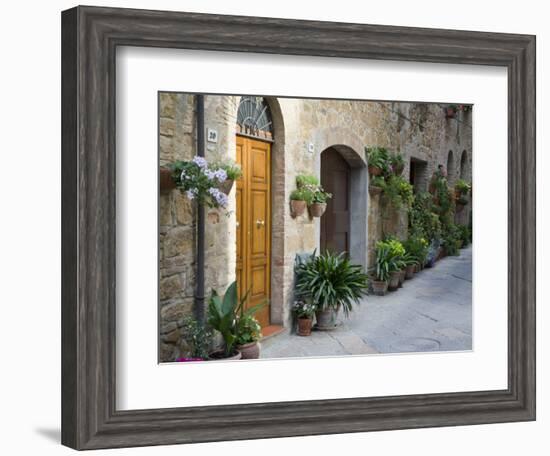 Flower Pots and Potted Plants Decorate a Narrow Street in Tuscan Village, Pienza, Italy-Dennis Flaherty-Framed Photographic Print