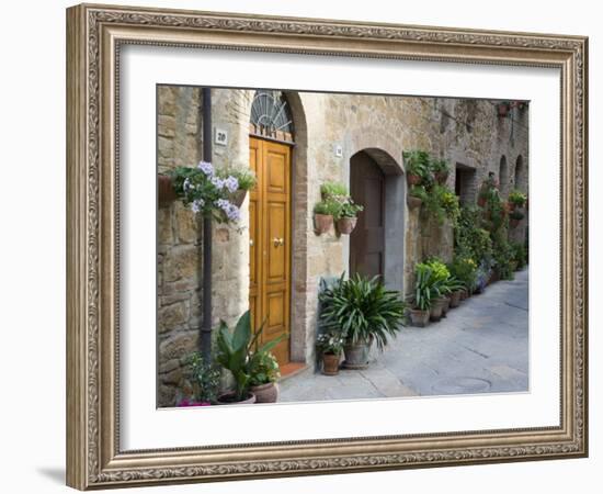 Flower Pots and Potted Plants Decorate a Narrow Street in Tuscan Village, Pienza, Italy-Dennis Flaherty-Framed Photographic Print