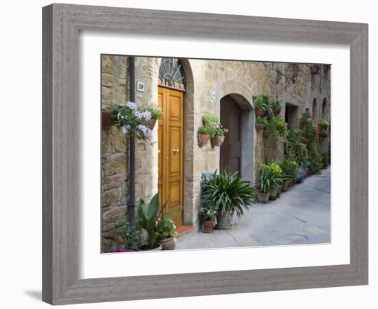 Flower Pots and Potted Plants Decorate a Narrow Street in Tuscan Village, Pienza, Italy-Dennis Flaherty-Framed Photographic Print