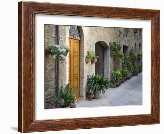 Flower Pots and Potted Plants Decorate a Narrow Street in Tuscan Village, Pienza, Italy-Dennis Flaherty-Framed Photographic Print