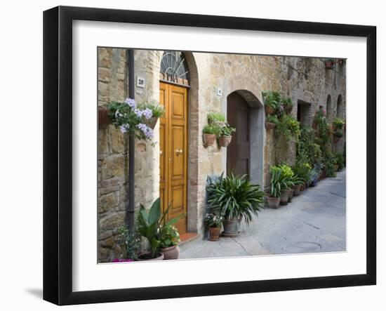 Flower Pots and Potted Plants Decorate a Narrow Street in Tuscan Village, Pienza, Italy-Dennis Flaherty-Framed Photographic Print