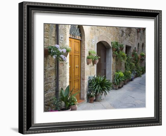 Flower Pots and Potted Plants Decorate a Narrow Street in Tuscan Village, Pienza, Italy-Dennis Flaherty-Framed Photographic Print