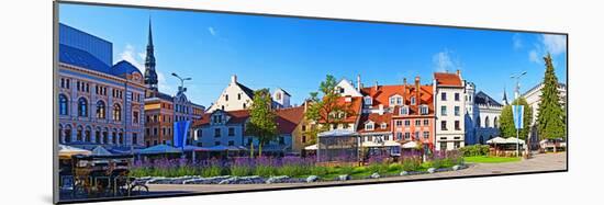 Flowers in a Garden with Buildings in the Background, Riga, Latvia-null-Mounted Photographic Print