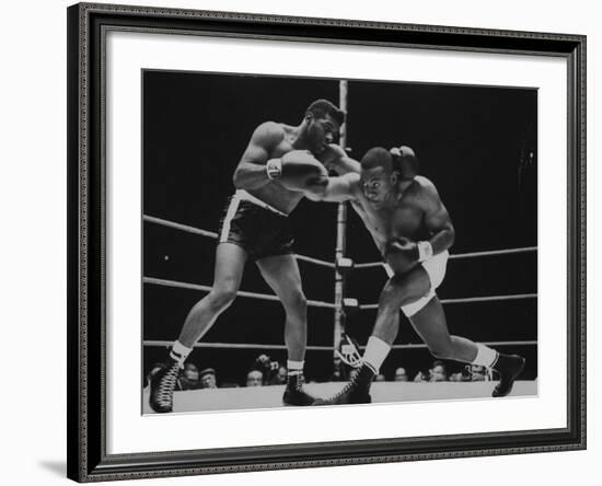 Floyd Patterson, and Sonny Liston During Championship Fight in Won by Liston in 1 1/2 Minutes-George Silk-Framed Premium Photographic Print