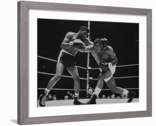 Floyd Patterson, and Sonny Liston During Championship Fight in Won by Liston in 1 1/2 Minutes-George Silk-Framed Premium Photographic Print