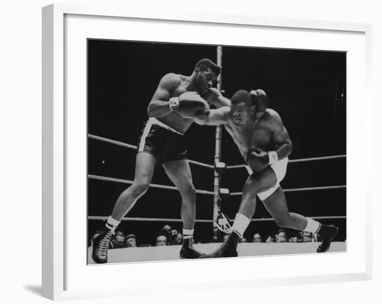 Floyd Patterson, and Sonny Liston During Championship Fight in Won by Liston in 1 1/2 Minutes-George Silk-Framed Premium Photographic Print