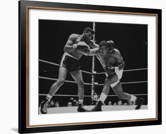 Floyd Patterson, and Sonny Liston During Championship Fight in Won by Liston in 1 1/2 Minutes-George Silk-Framed Premium Photographic Print