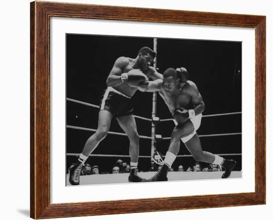 Floyd Patterson, and Sonny Liston During Championship Fight in Won by Liston in 1 1/2 Minutes-George Silk-Framed Premium Photographic Print