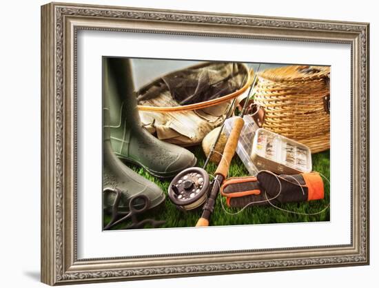 Fly Fishing Equipment on Grass-null-Framed Art Print