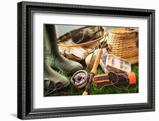 Fly Fishing Equipment on Grass-null-Framed Art Print