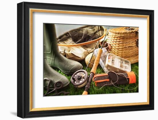 Fly Fishing Equipment on Grass-null-Framed Art Print