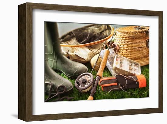 Fly Fishing Equipment on Grass-null-Framed Art Print