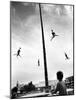 Flying Pole Dance or Voladores, Being Peformed by Aztec-Maya Ballet Co. at Dunes Hotels-Allan Grant-Mounted Photographic Print