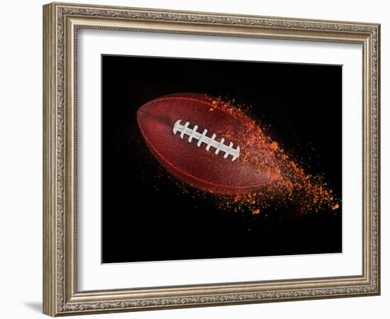 Flying Rugby Ball Isolated on Black.-Kesu01-Framed Photographic Print