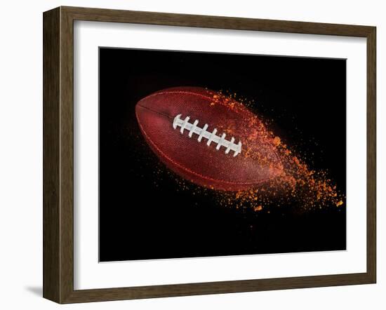 Flying Rugby Ball Isolated on Black.-Kesu01-Framed Photographic Print