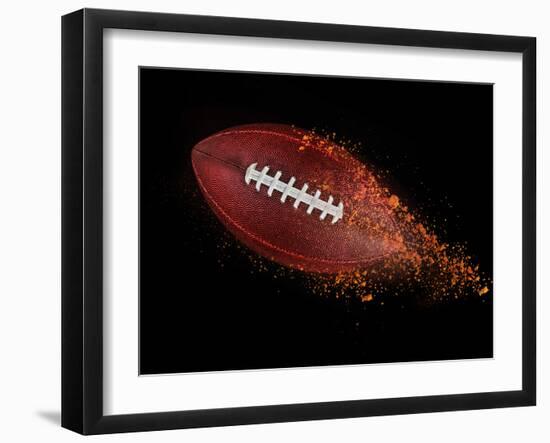 Flying Rugby Ball Isolated on Black.-Kesu01-Framed Photographic Print