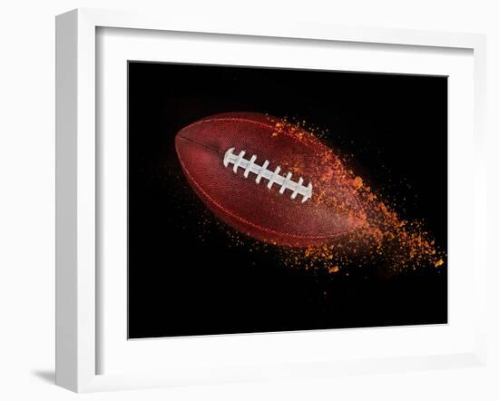 Flying Rugby Ball Isolated on Black.-Kesu01-Framed Photographic Print