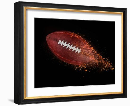 Flying Rugby Ball Isolated on Black.-Kesu01-Framed Photographic Print