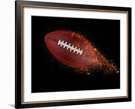 Flying Rugby Ball Isolated on Black.-Kesu01-Framed Photographic Print