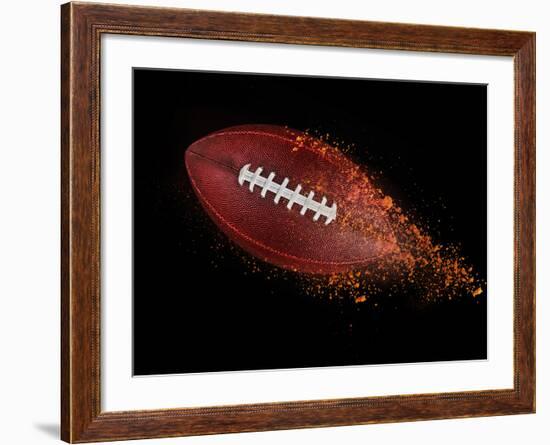 Flying Rugby Ball Isolated on Black.-Kesu01-Framed Photographic Print