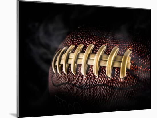 Flying Rugby Ball Isolated on Black.-Kesu01-Mounted Photographic Print