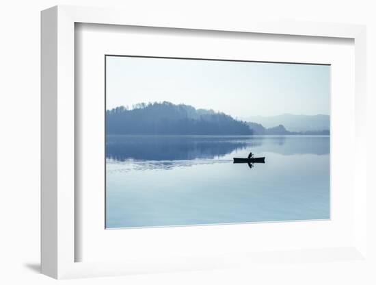 Fog over the Lake. in Calm Water Reflection Mirror. Man with a Paddle in the Boat. Black and White.-null-Framed Photographic Print