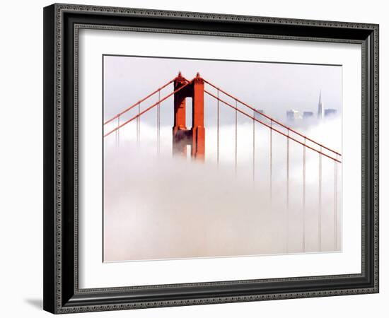 Fog Swirls and Covers All of Golden Gate Bridge Save the North Tower and the Tips of Skyscrapers-null-Framed Photographic Print