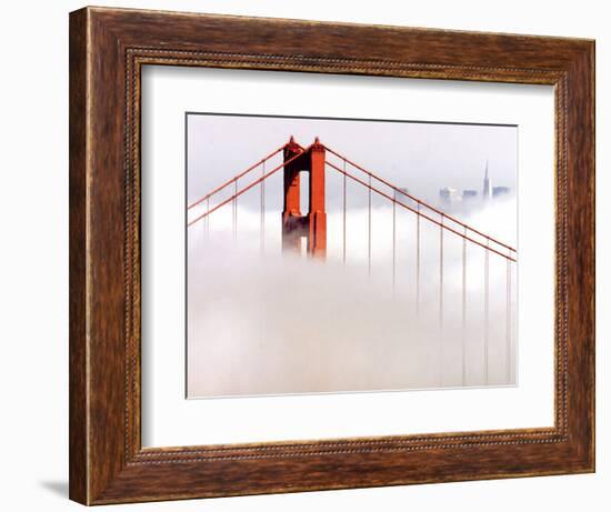 Fog Swirls and Covers All of Golden Gate Bridge Save the North Tower and the Tips of Skyscrapers-null-Framed Photographic Print