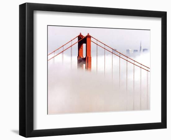 Fog Swirls and Covers All of Golden Gate Bridge Save the North Tower and the Tips of Skyscrapers--Framed Photographic Print