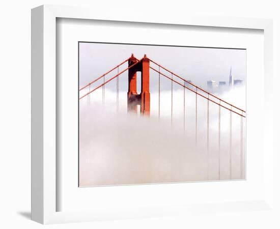 Fog Swirls and Covers All of Golden Gate Bridge Save the North Tower and the Tips of Skyscrapers--Framed Photographic Print