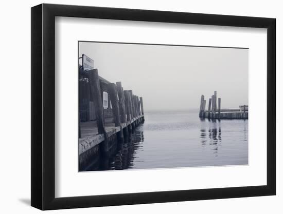 Foggy view of the docks at the ferry at Ocean Beach Fire Island NY-null-Framed Photo