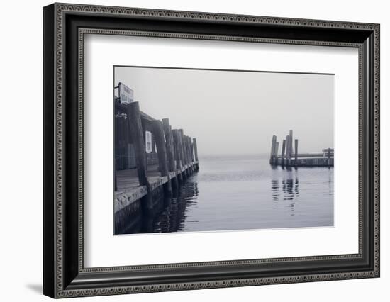 Foggy view of the docks at the ferry at Ocean Beach Fire Island NY-null-Framed Photo