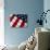 Folded American Flag-Joseph Sohm-Photographic Print displayed on a wall