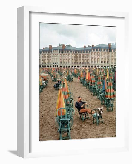 Folded Umbrellas Reflect Nearly Deserted Status of Mar Del Plata Beach-Leonard Mccombe-Framed Photographic Print
