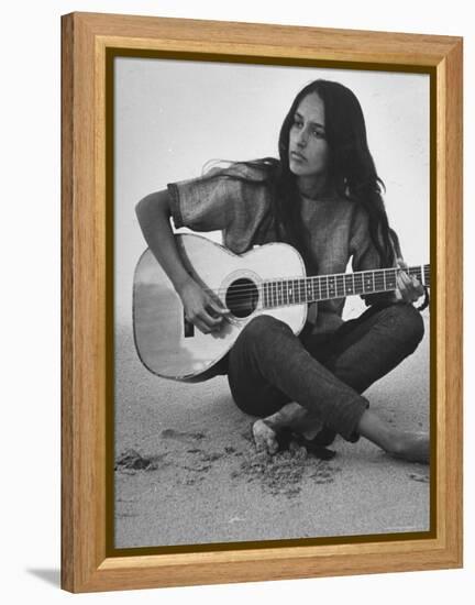 Folk Singer Joan Baez Strumming Her Guitar on the Beach Near Her Home-Ralph Crane-Framed Premier Image Canvas