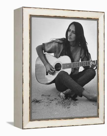 Folk Singer Joan Baez Strumming Her Guitar on the Beach Near Her Home-Ralph Crane-Framed Premier Image Canvas